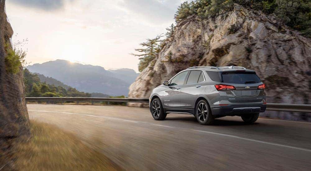A grey 2022 Chevy Equinox is shown from the rear at an angle.