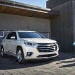 A white 2021 Chevy Traverse for sale is shown from the front at an angle.