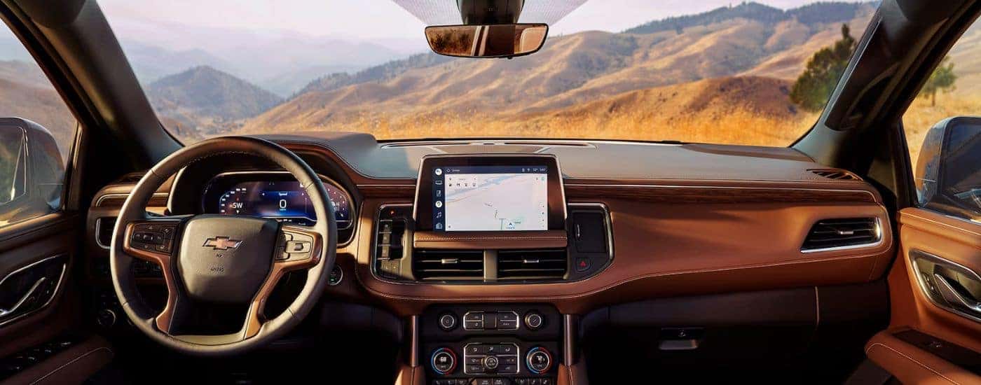 Brown leather upholstery in a cabin of a 2023 Chevy Suburban High Country.