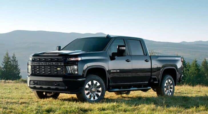 Black 2023 Chevy Silverado 2500HD parked off-road
