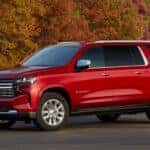 A red 2022 Chevy Suburban for sale in Nashville is shown from the side.