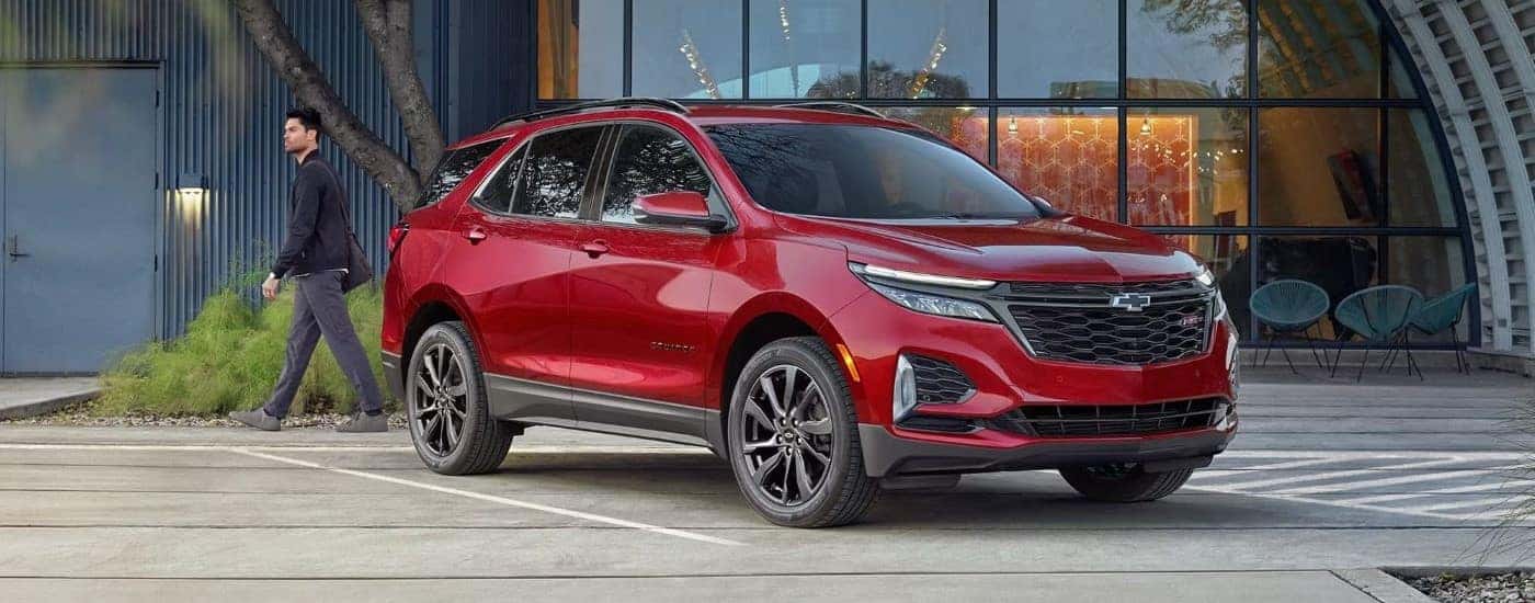 Parked red 2024 Chevy Equinox RS for sale.