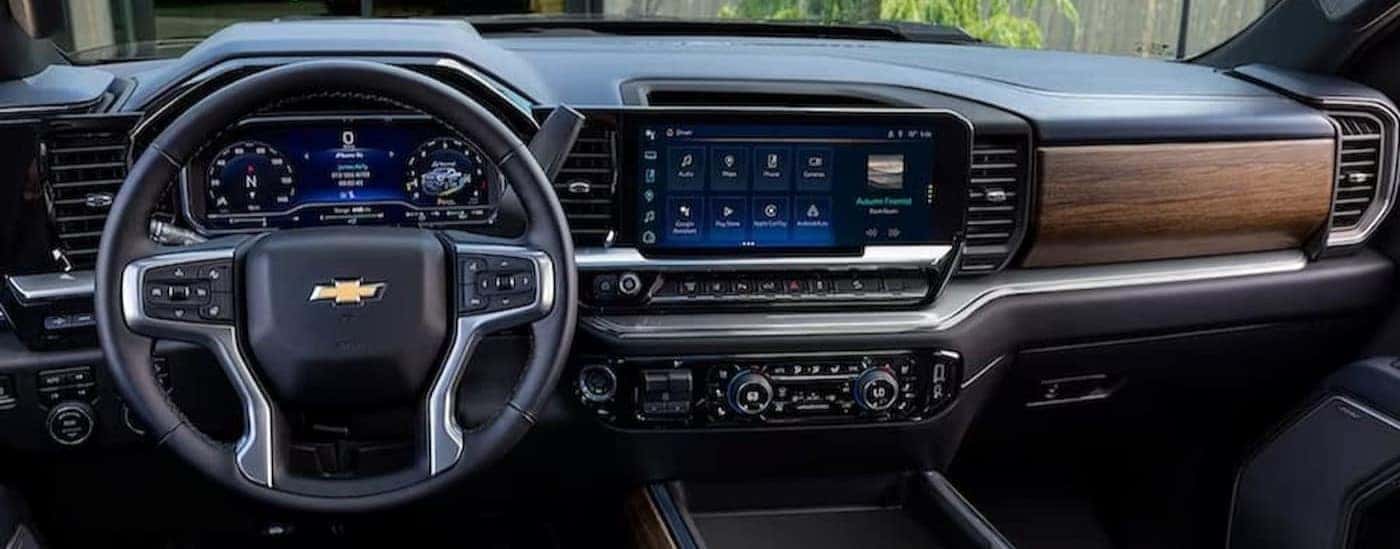The black and brown dash in a 2024 Chevy Silverado 2500 HD.