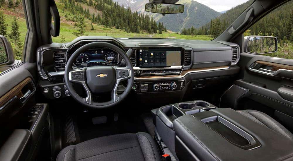 The black interior of a 2024 Chevy Silverado 1500 for sale.