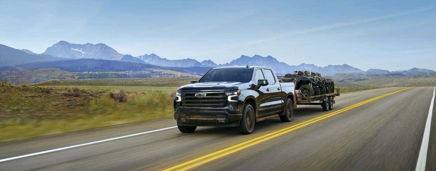 A black 2025 Chevy Silverado 1500 for sale from the front.