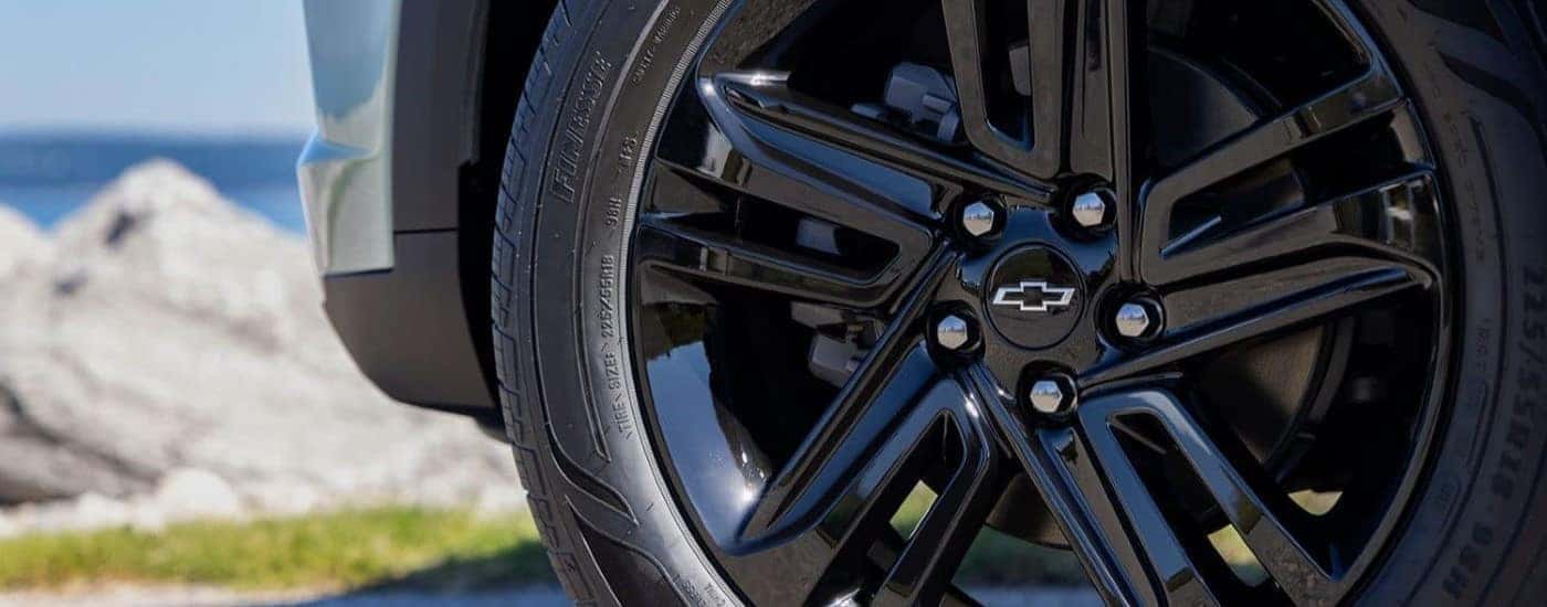 Close-up of a black wheel on a 2024 Chevy Trax.