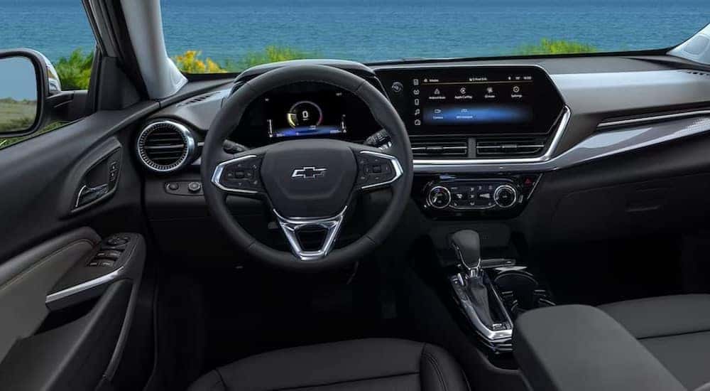 The black interior and dash in a 2024 Chevy Trax.