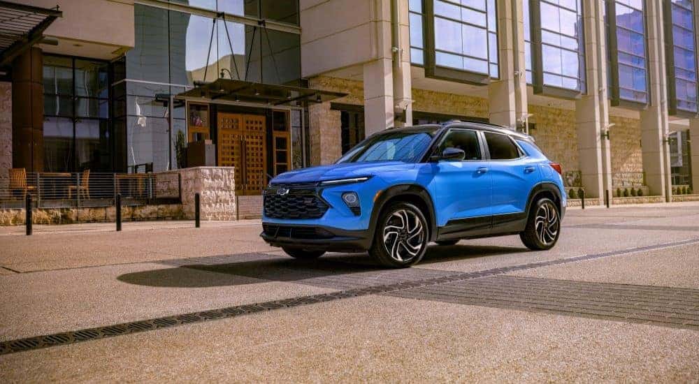A blue 2025 Chevy Trailblazer parked on a city street