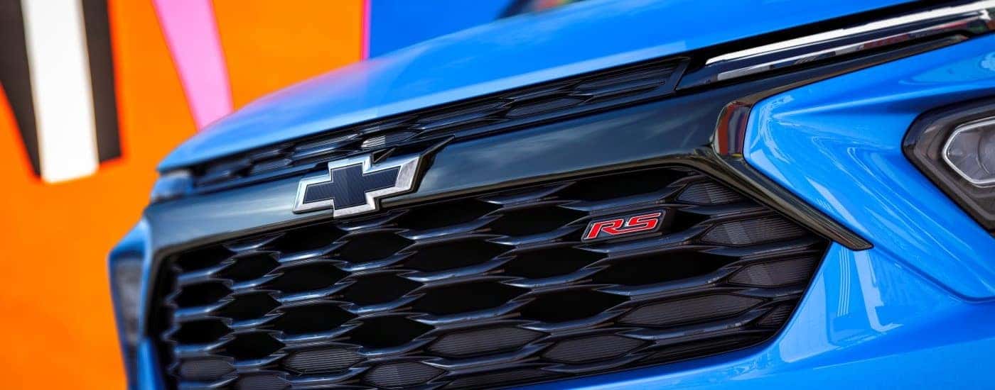 Chevy logo on the grille of a 2024 Chevy Trailblazer RS for sale in Dallas