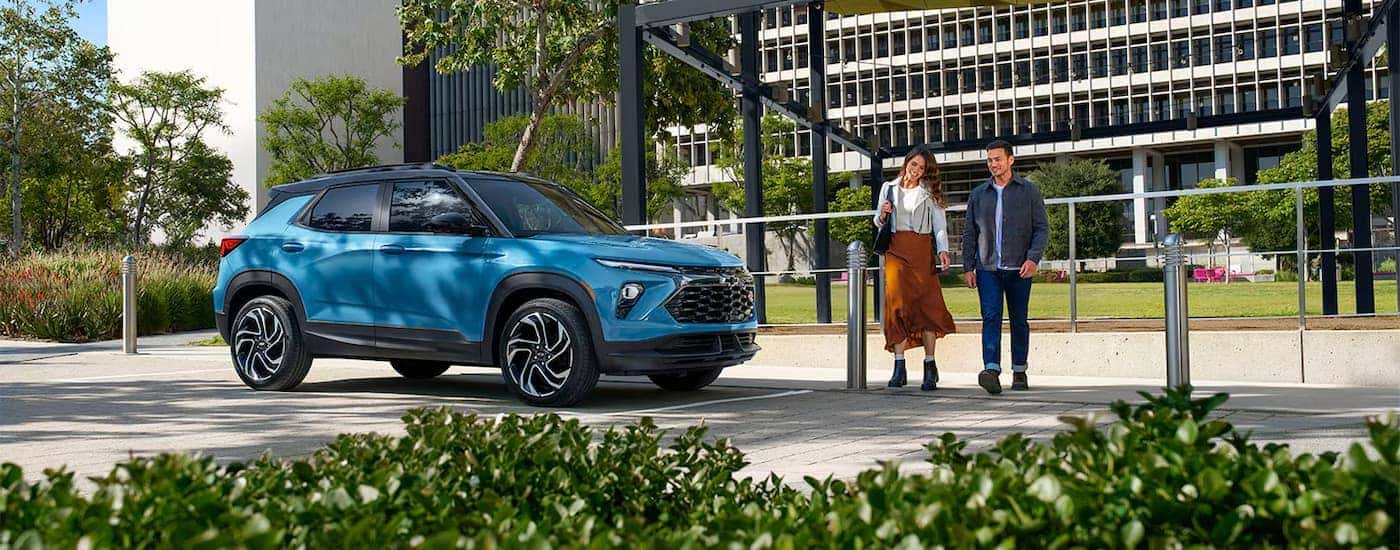 A blue 2025 Chevy Trailblazer parked in a city
