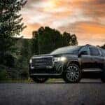 Black 2020 GMC Acadia parked in a driveway