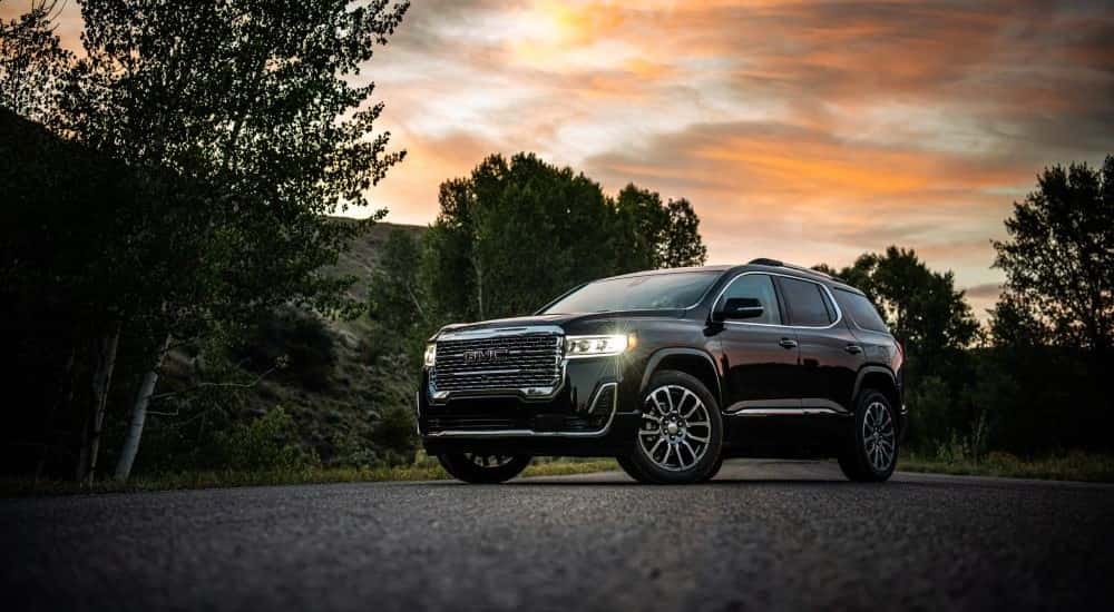 Black 2020 GMC Acadia parked in a driveway