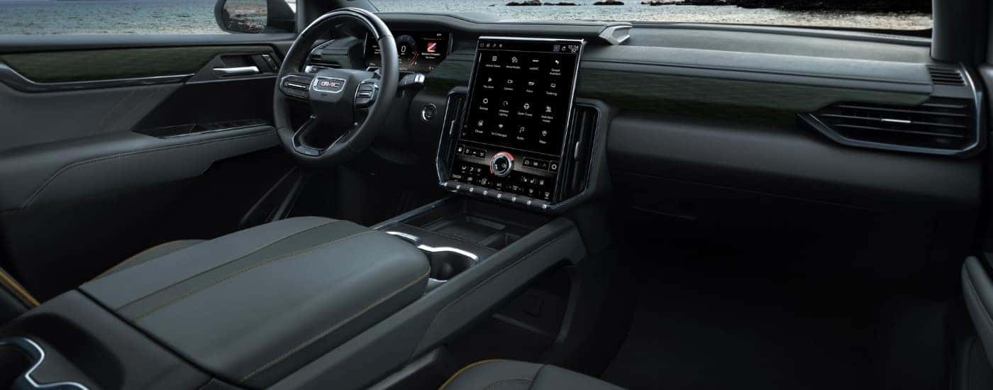 Infotainment and digital gauge cluster on a 2024 GMC Acadia for sale in Cleveland