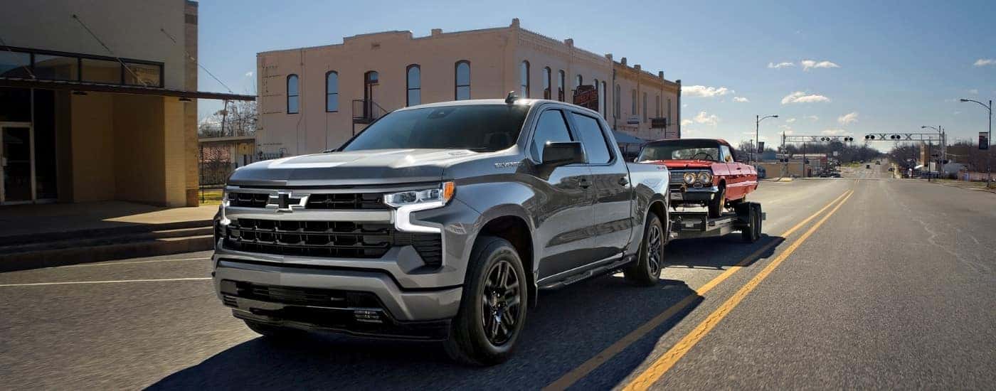 A silver 2024 Chevy Silverado 1500 from the front.