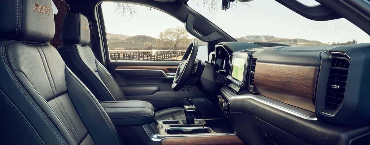 The black and brown interior in a 2024 Chevy Silverado 1500 for sale in Columbus.