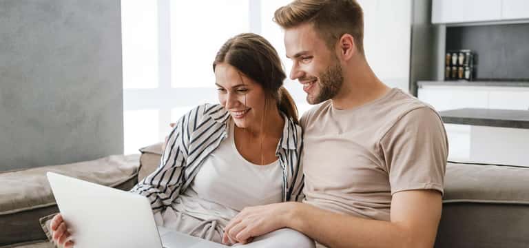 couple looking at computer