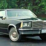 1983 Chevy malibu from the front at an angle parked.