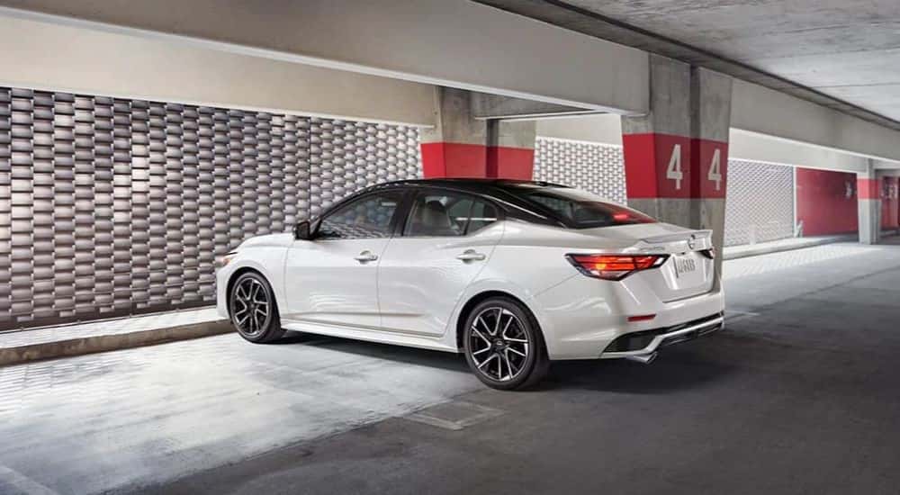 White 2024 Nissan Sentra parked from the back at an angle.