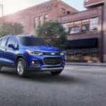 Blue 2017 Chevy Trax rounding a corner