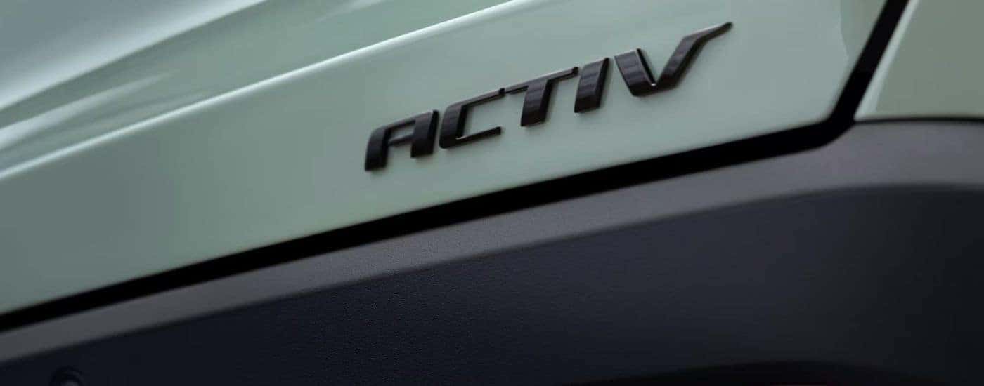 ACTIV badge on a green 2025 Chevy Equinox