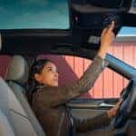 A person driving in a 2021 Volkswagen Tiguan.