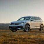 White 2023 Volkswagen Tiguan parked on a field