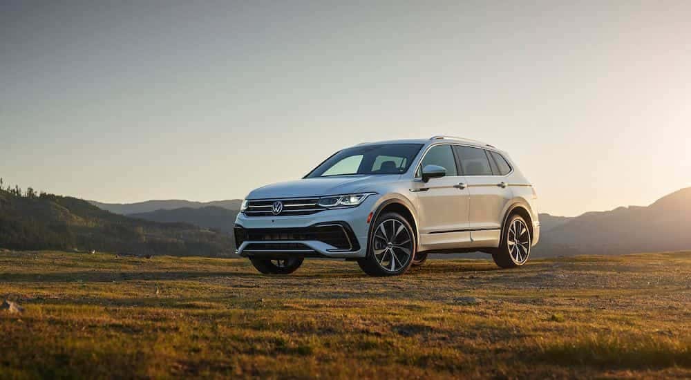 White 2023 Volkswagen Tiguan parked on a field