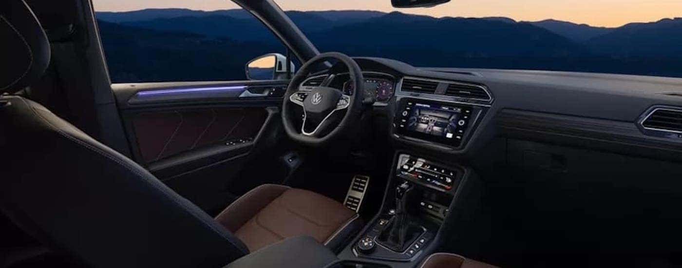 The black interior of a 2022 Volkswagen Tiguan.