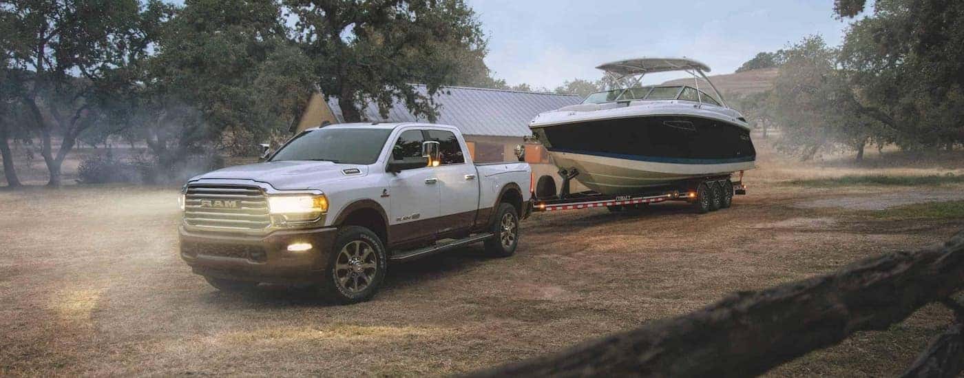 Silver 2020 Ram 2500 towing a boat