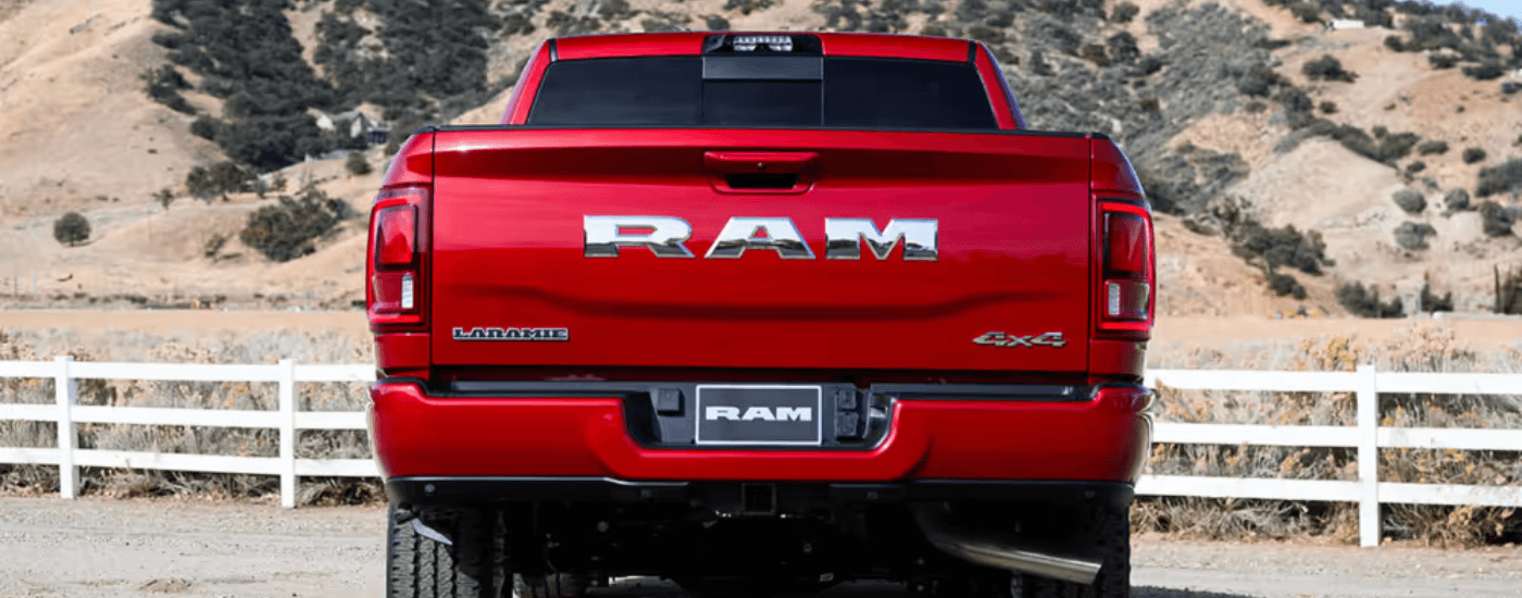Tailgate of a red 2026 Ram 2500 LARAMIE