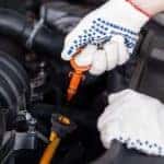 Mechanic changing oil