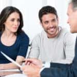 couple talking to finance guy