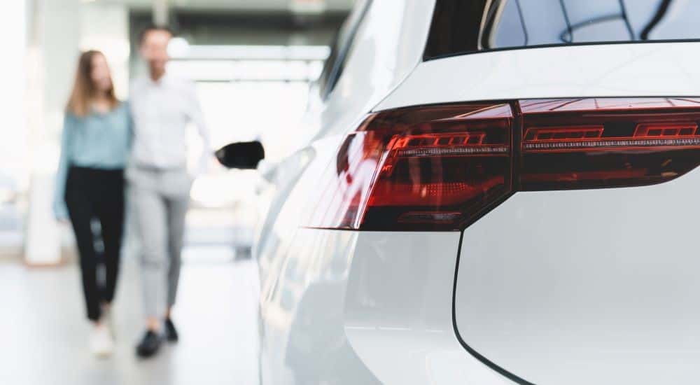 Close up of a vehicle taillight at a dealership.