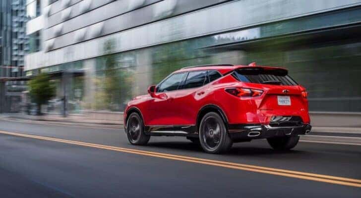 A red 2020 Chevy Blazer RS is shown from the rear at an angle.