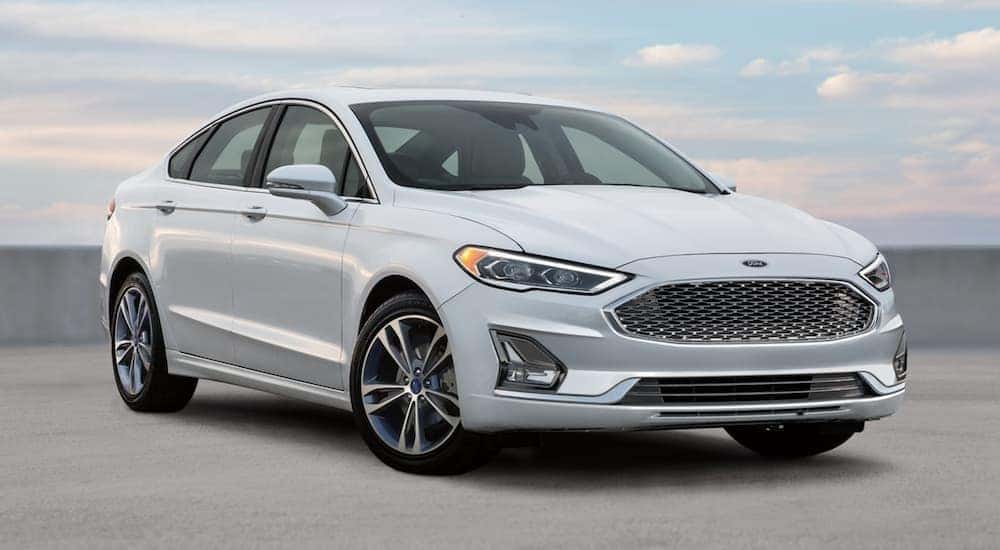 White 2020 Ford Fusion is shown parked.