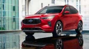 A red 2024 Ford Escape ST-Line is shown parked after viewing a used Ford for sale.