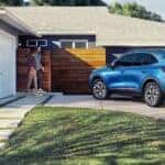 A blue 2022 Ford Escape from the rear at an angle.