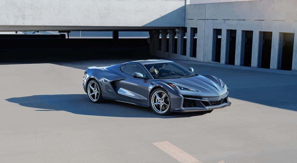 A silver 2024 Chevy Corvette E-Ray from the side.