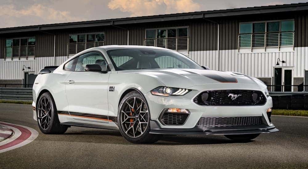 A white 2023 Ford Mustang Mach 1 from the front at an angle.