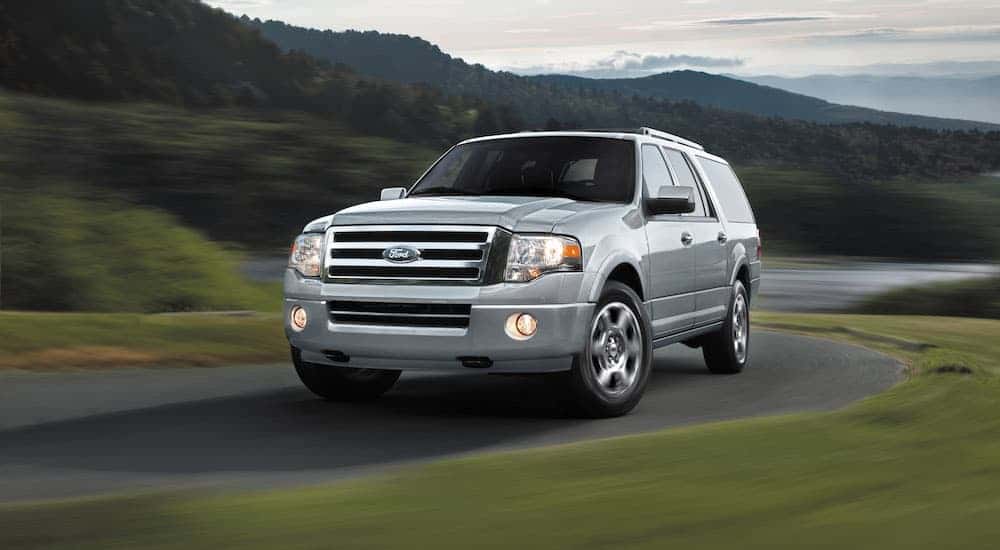 White 2013 Ford Expedition from the front at an angle.