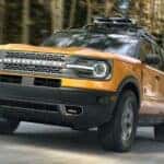 Used yellow 2021 Ford Bronco for sale near Schenectady from the front at an angle.