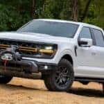 A white 2024 Ford F-150 from the front.