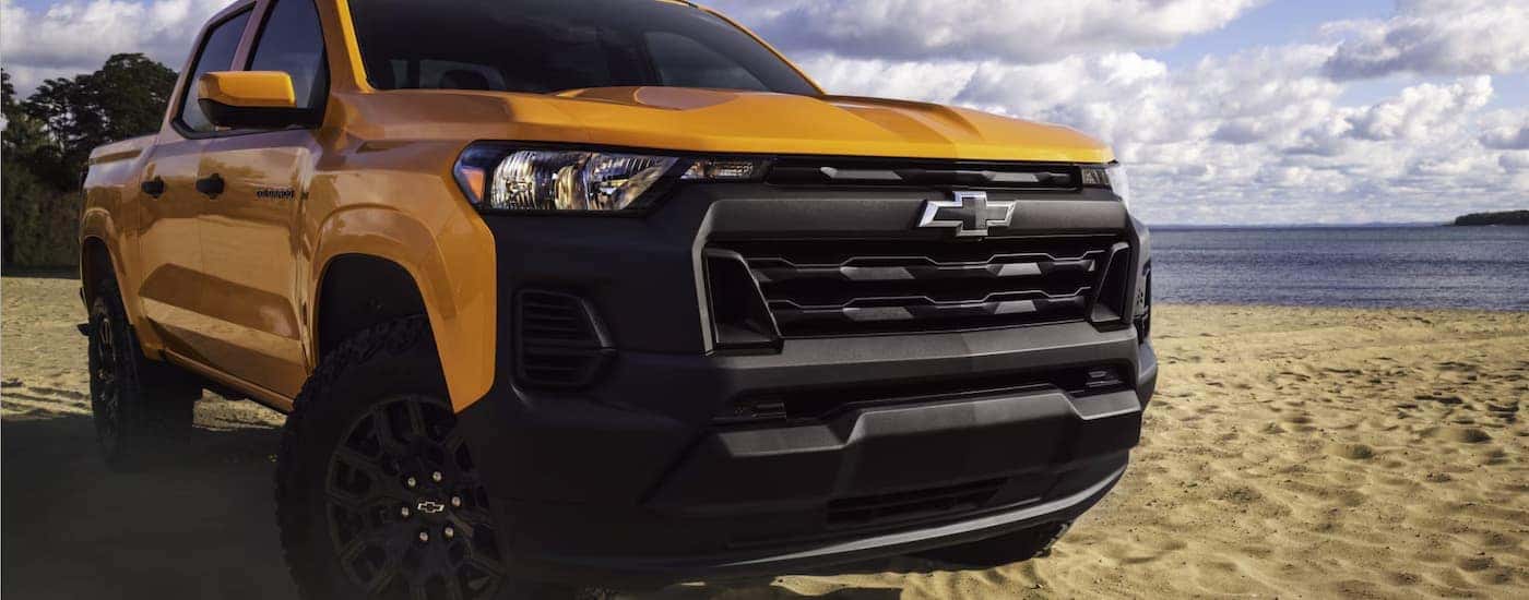 Blue 2025 Chevy Colorado parked on a beach
