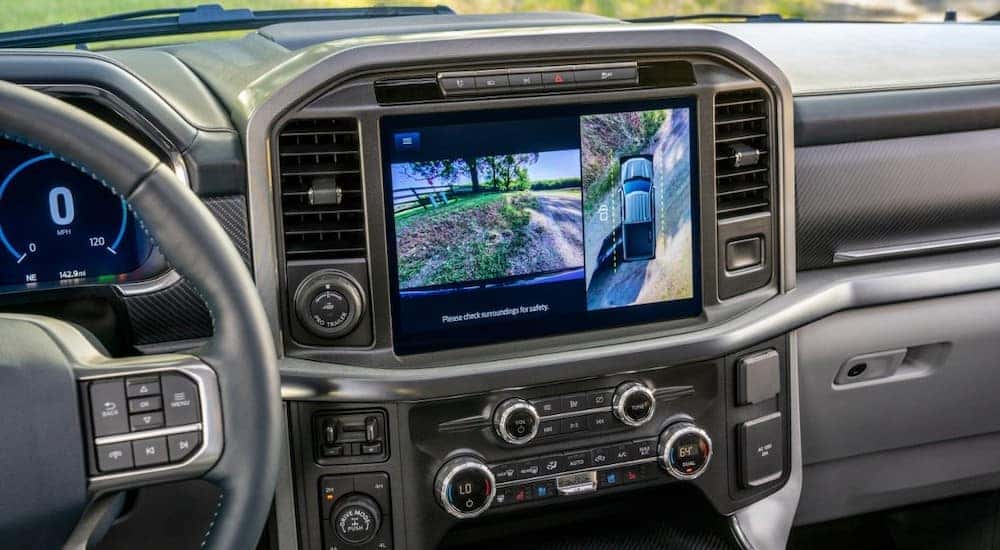 Infotainment screen and steering wheel inside the 2018 Ford F-150 pickup truck
