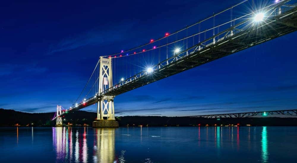 Mid Hudson Bridge lit up across the Hudson river near Poughkeepsie, NY
