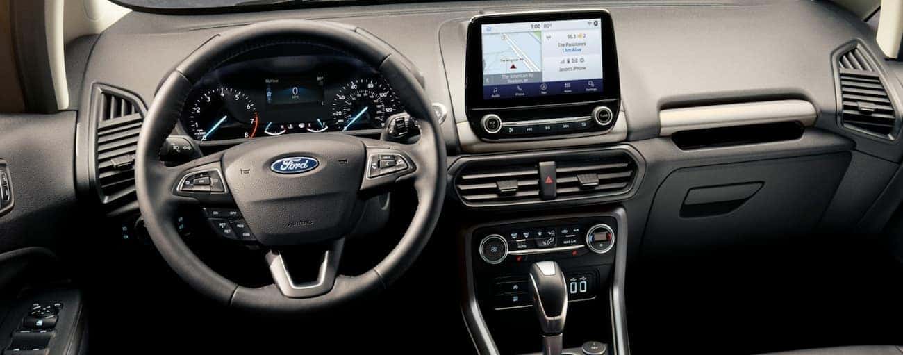 The dashboard and touchscreen in a 2020 Ford EcoSport are shown.