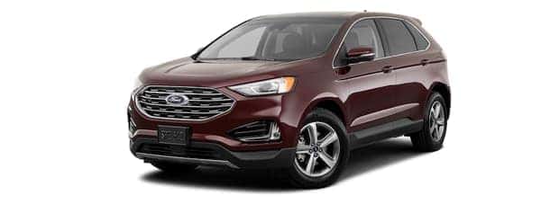 A burgundy 2020 Ford Edge is facing left.