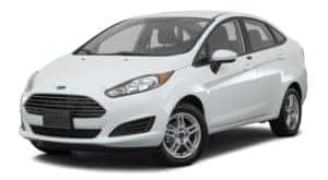 A white 2017 Ford Fiesta is facing left.