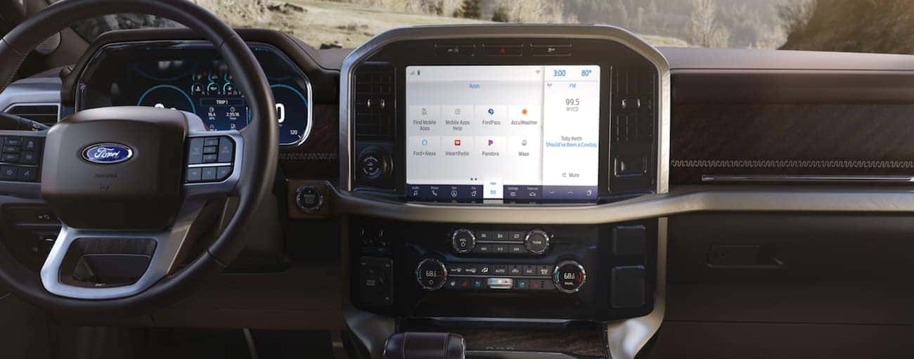 The infotainment screen is shown in a 2021 Ford F-150.