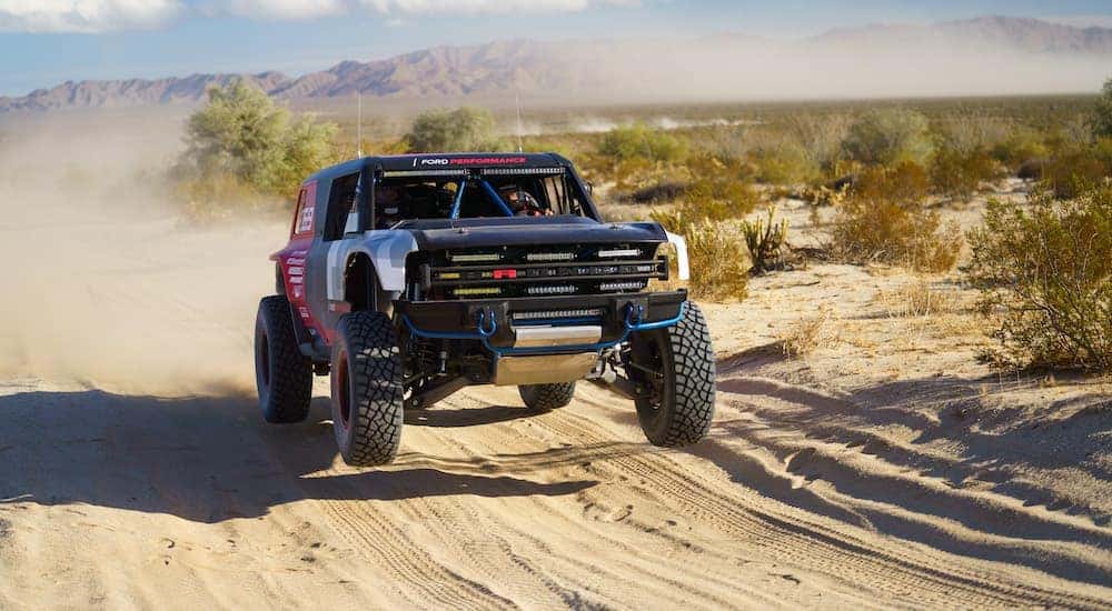A 2021 Ford Bronco is racing on a sandy trail outside of Albany, NY.